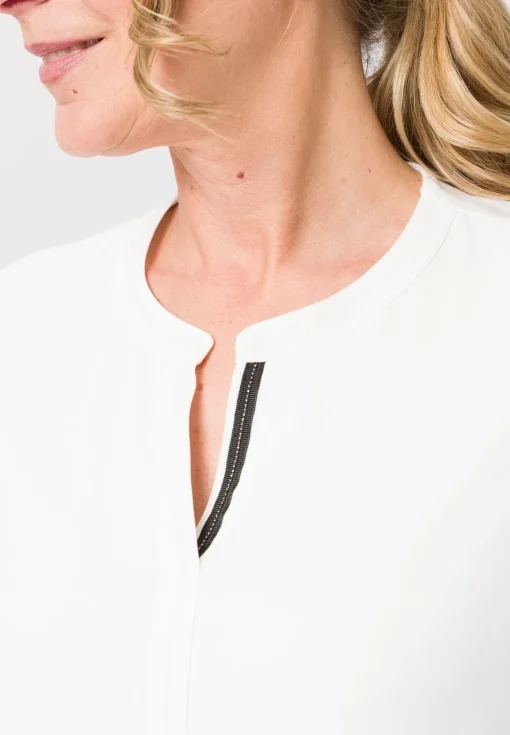 Blusenshirt mit dekorativem Schmuckband